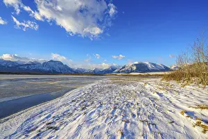 Wind: The snow-covered shoreline of windswept Maskinonge Lake in Waterton Lakes National Park