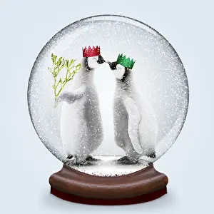 Mistletoe: Snow globe of Penguins kissing under mistletoe