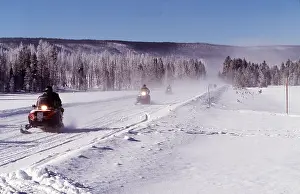 Snowmobiles: SNOW MOBILES - Crossing Yellowstone National Park