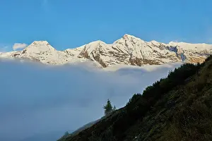 Pinzgau: Snowy Mountains above the clouds at Hochalpenstraie