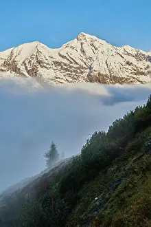 Pinzgau: Snowy Mountains above the clouds at Hochalpenstraie