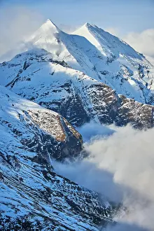 Pinzgau: Snowy Mountains above the clouds at Hochalpenstraie