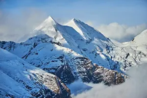 Pinzgau: Snowy Mountains above the clouds at Hochalpenstraie