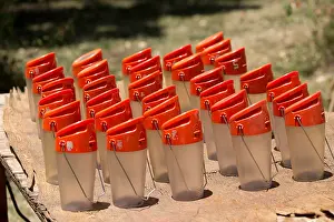 Charging: Many solar lights on table charging in sunlight