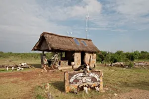 Thatched: Solar PV Panels & Wind Turbine - on thatched roof