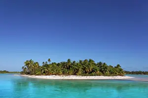 Leeward: Solitary island in lagoon, beach with palm trees