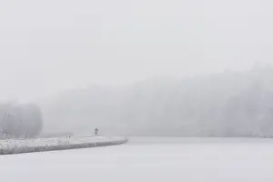 Heavy: Somebody is cycling through heavy snow and mist