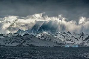 Opening: South Georgia Island. Opening in clouds and Virga