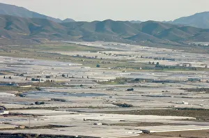 Greenhouses: Spain - Masses of plastic greenhouses at the edge