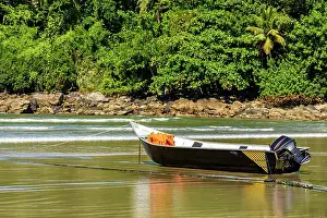 Cruise: Speedboat standing on the sand of the beach with