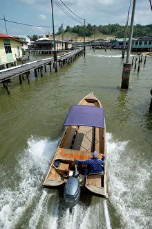 Bandar: Speedboat in Water Village Water taxi passing walkway