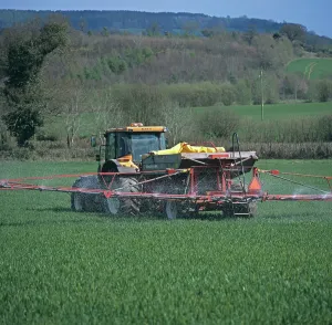 Boom: Spreading Fertilizer on Wheat Crop