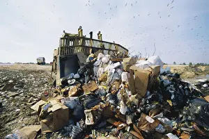 Truck: Spreading Waste in Landfill