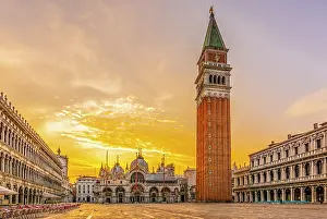 Famous: St. Marks Square, Venice, Italy. Wide angle view at sunrise