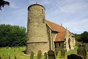 Churchyard: St Marys Church with round stone tower