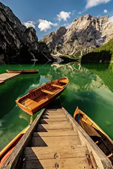 Pragser: Stairs in mountain lake with boats, Seekogel peak