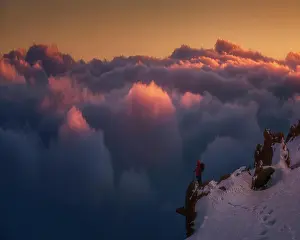Mountaineer: Standing above the clouds. One of the most beautiful
