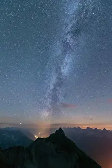 Starry: Starry sky with Milky Way and Lechtal Alps in the