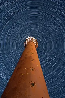 Vesterlen: a startrail picture above the lighthouse