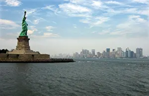 Towns: Statue of Liberty and the skyline of Manhattan