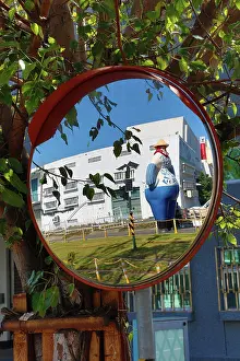 Mirrors: Statue at the Pier 2 Art Center in a mirror