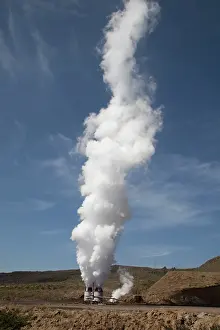 Vents: Steam plumes rising from vents on geothermal development