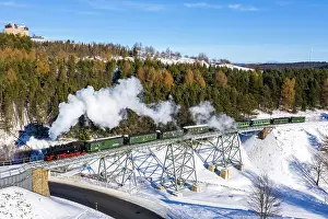 Viaduct: Steam train of the Fichtelbergbahn railway Steam