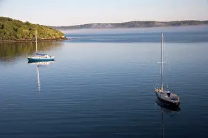 Moored: Steward Island, New Zealand. Overlooking