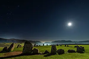 Cumbria: Stone circle at full moon with starry sky, Keswick