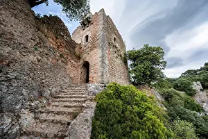 Defence: Stone steps and tower of the castle ruins Castell Alarn