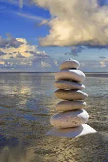 Silence: Stones, pebbles, pebble tower on the beach of the