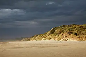 Approaching: Storm Clouds Approaching Ocean Beach, Strahan