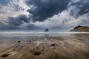 Storm: Storm clouds at low tide on beach at Cape Kiwanda