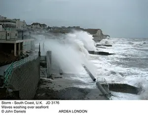 Defences: STORM - Waves washing over seafront