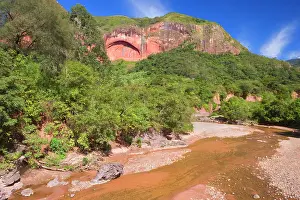 Meanders: Stream meanders through tropical rainforest in