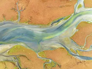 Tides: Streams at low tide in the marshland of the Walvis Bay lagoon