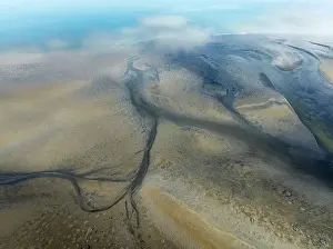 Tides: Streams and marshes at low tide in the coastal wetlands of the Walvis Bay lagoon