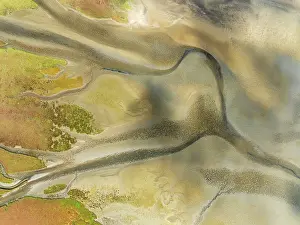 Tides: Streams and marshes at low tide in the wetlands of the Walvis Bay lagoon