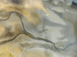 Tides: Streams and marshes at low tide in the wetlands of the Walvis Bay lagoon