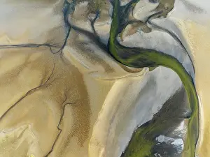 Tides: Streams and marshes at low tide in the wetlands of the Walvis Bay lagoon