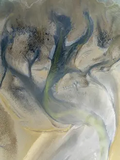 Tides: Streams and marshes at low tide in the wetlands of the Walvis Bay lagoon