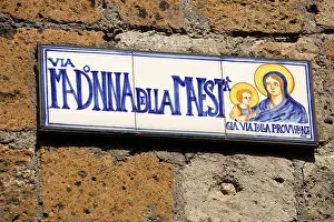 Signs: Street sign for the Via Madonna della Maesta in