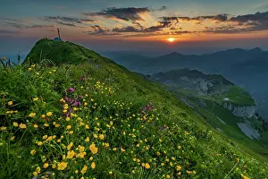 Appenzell: Summery mountain meadow with summit cross and small