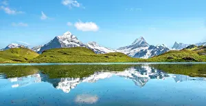 Grindelwald: Summits Schreckhorn and Finsteraarhorn are reflected