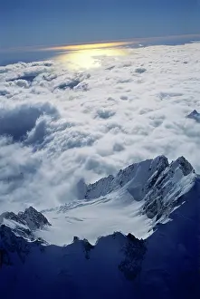 Beneath: Sunlight reflects off the Tasman Sea beneath