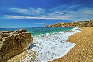 Gravel: Sunny summer day on pebble and sandy beach Paleochori b