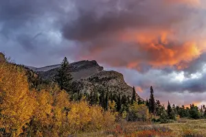 Aspen: Sunrise clouds over Bear Mountain in Glacier National