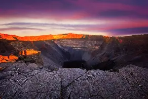Reunion: Sunrise on the Dolomieu crater at the summit of