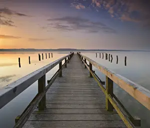 Mooring: Sunrise at Lake Ratzeburg, long jetty, symmetry