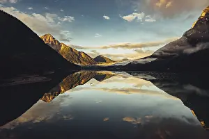Tyrol: Sunrise with reflections in Lake Heiterwanger See in Tyrol in the Alps in Austria